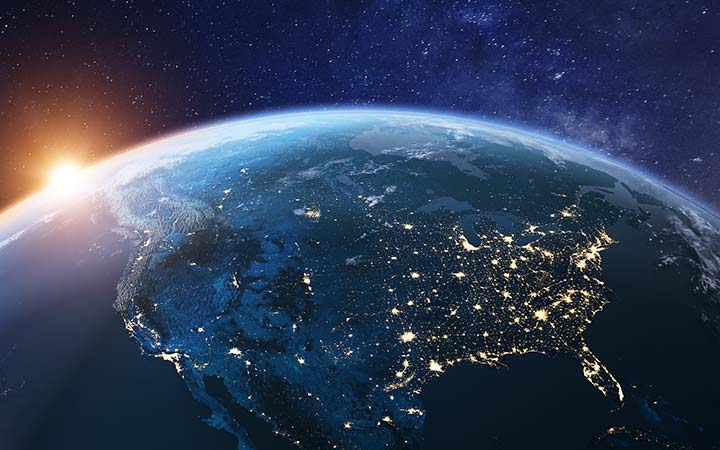 The earth seen from space at night.